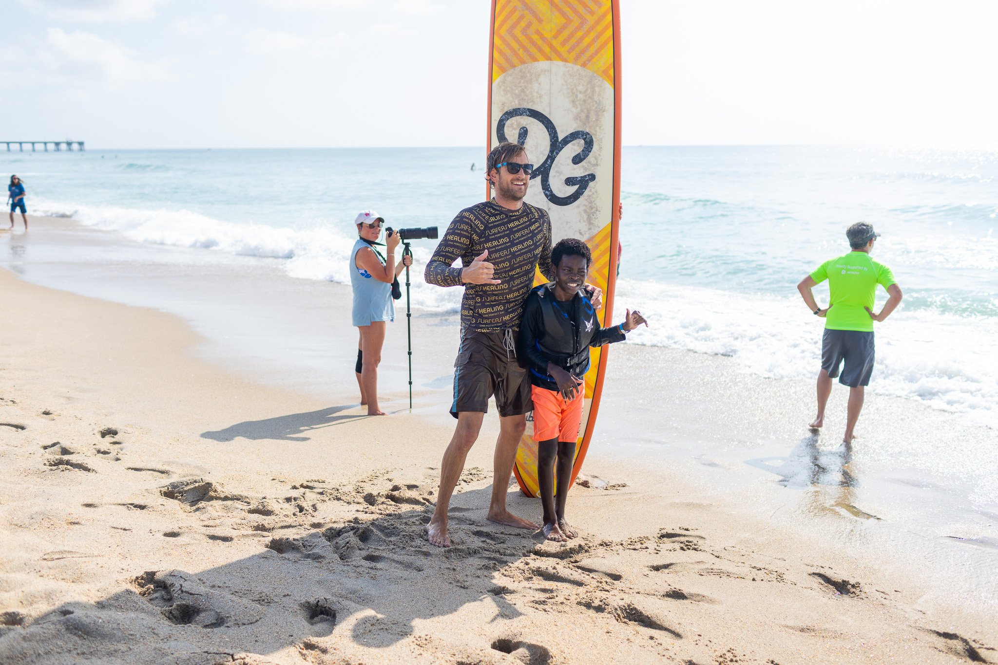 surfers healing autism beach volunteers
