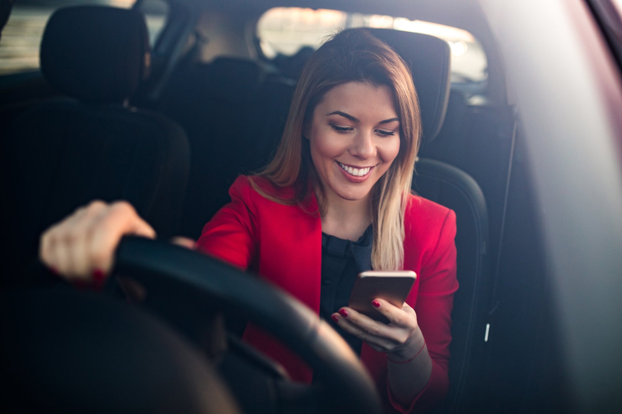 Woman accessing digital ID card on The Wells App