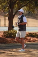 Brad golfing