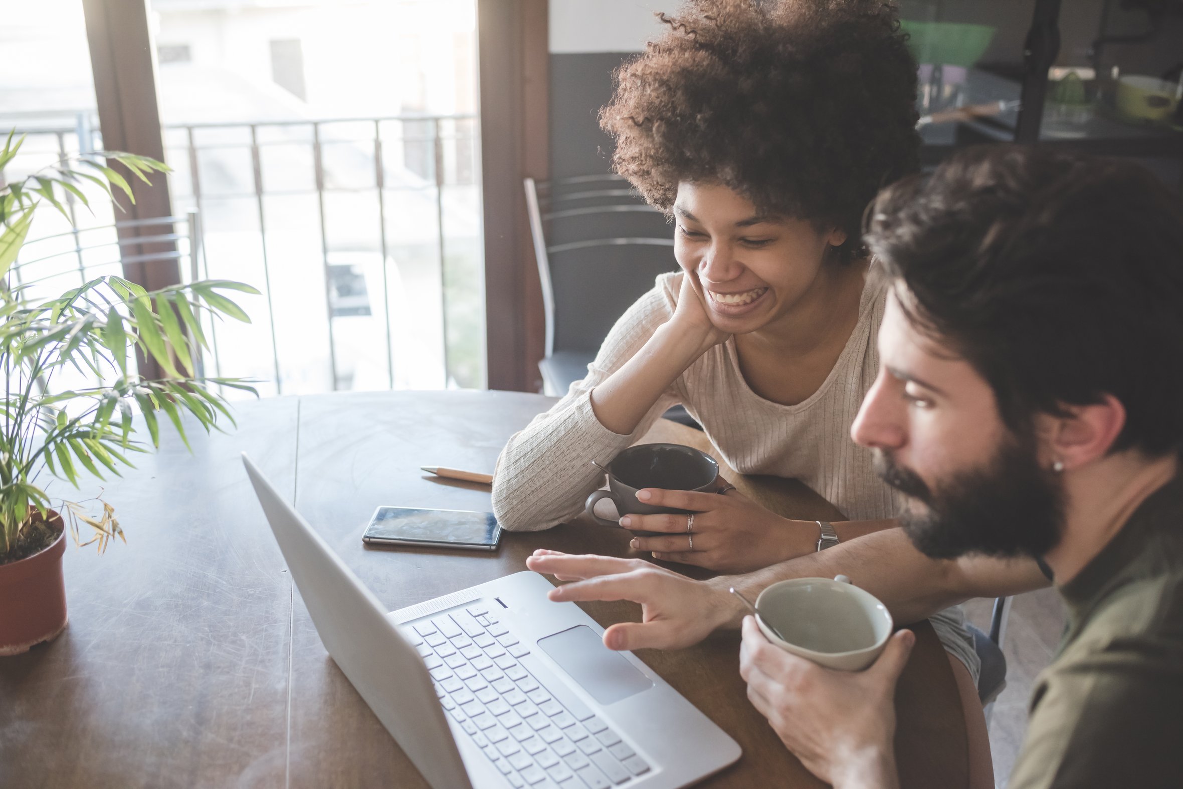 Couple accessing secure insurance documents  digitally through The Wells Appstorage